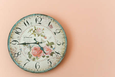 clock on pink wallの写真素材