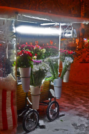 Flower stand in snowy weatherの写真素材