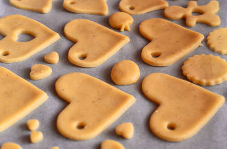 Cookies in tray to bakeの写真素材