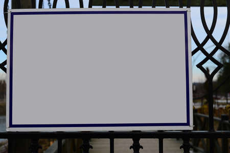 Blank billboard on iron doorの写真素材