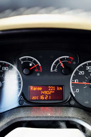 Dashboard and road computer of the car showing range