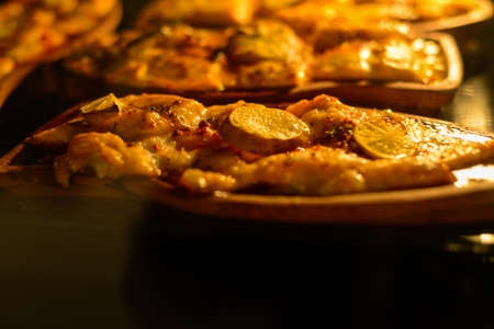 Salmon fish cooked in ovenの写真素材