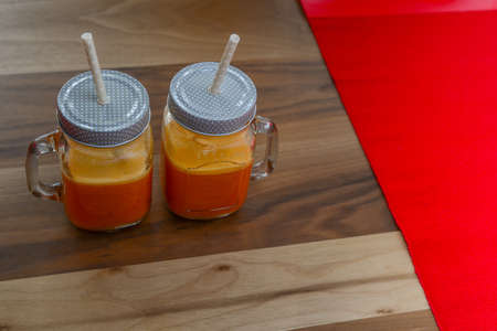 Homemade fruit juices with sandwich backgroundの写真素材