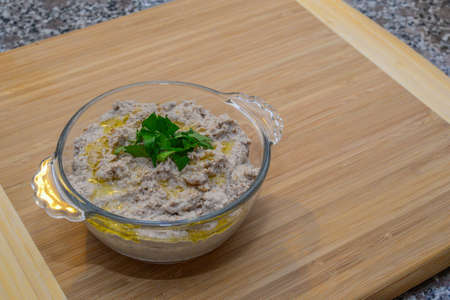 Smashed chickpea appetizer on wood backgroundの写真素材