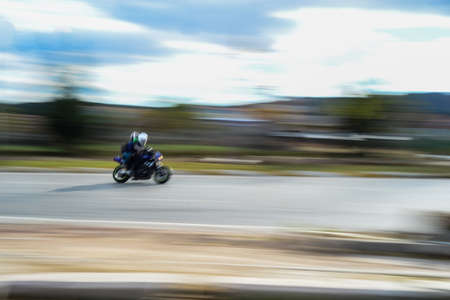 Race bike pass by panningの写真素材