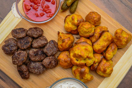 Meatballs with appetizers homemade on wood backgroundの写真素材