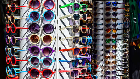 Colorful sunglasses on the shelf