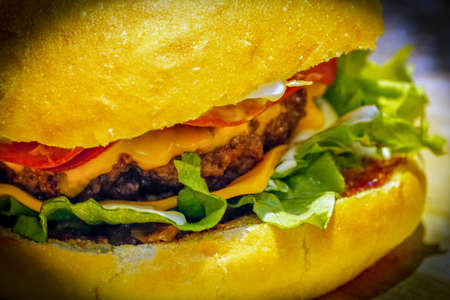 Preparing homemade fresh juicy burger close up viewの写真素材