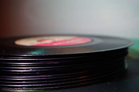 Stacked vinyl collection close up view