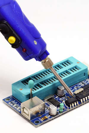 Battery powered soldering iron on white isolated backgroundの写真素材