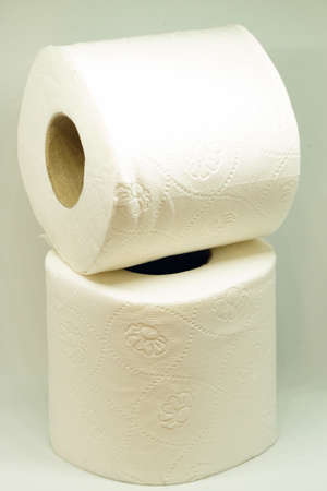 White toilet paper roll on white isolated backgroundの写真素材