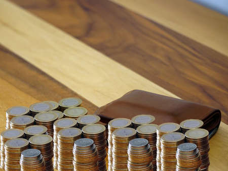 Turkish coin liras and purse on wooden background cleavage for the text availableの写真素材