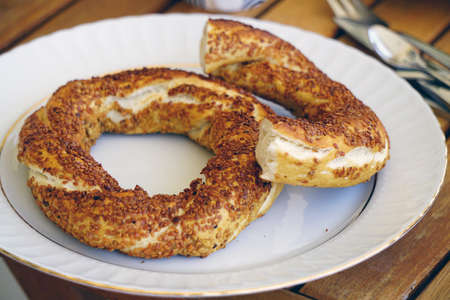 Traditional istanbul bagel simit for breakfast on wooden backgroundの写真素材