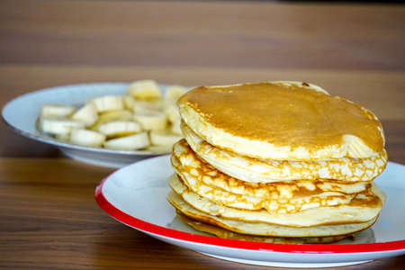 Homemade pancake hazelnut cream and jam breakfast dessertの写真素材