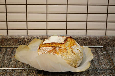 Sour yeast artisan home made baked bread in the kitchenの写真素材
