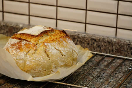 Sour yeast artisan home made baked bread in the kitchenの写真素材
