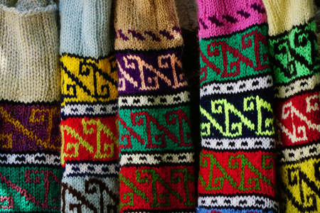 Hand knitting bootee with authentic patterns with vivid colors