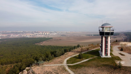 29 December 2020 Eskisehir Turkey. Scenery tower in Eskisehir city forest among the pine trees aerial drone viewのeditorial素材