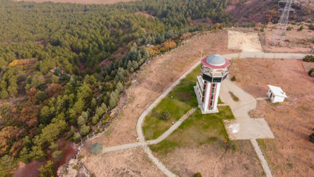 29 December 2020 Eskisehir Turkey. Scenery tower in Eskisehir city forest among the pine trees aerial drone viewのeditorial素材
