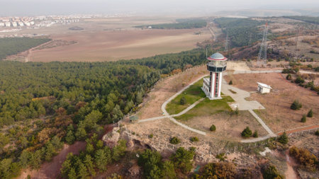 29 December 2020 Eskisehir Turkey. Scenery tower in Eskisehir city forest among the pine trees aerial drone viewのeditorial素材