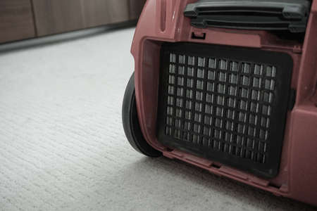Dirty hepa filter on vacuum cleaner close up viewの写真素材