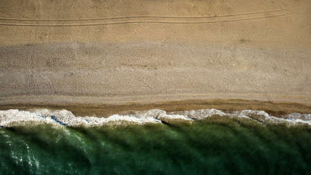 Empty beach coastline in the autumn aerial drone viewの写真素材