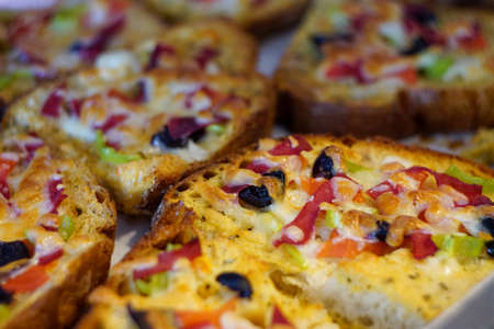 Home made breakfast pizza close up view with shallow depth of fieldの写真素材