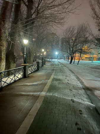 Frozen Porsuk river in Eskisehir at Kanlikavak park at night snow scenesの写真素材