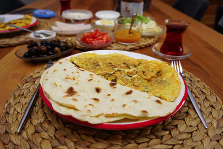 Hand made lavash bread and Turkish breakfast on wooden tableの写真素材
