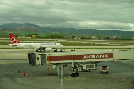 7 May 2022 Ankara Turkey. Boarding Pegasus airlines plane on Esenboga airportのeditorial素材