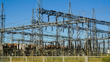 Electricity distribution facility with power lines close up viewの写真素材