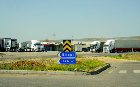 12 May 2022 Cizre Sirnak Turkey. Habur Silopi road sign on a sunny dayのeditorial素材