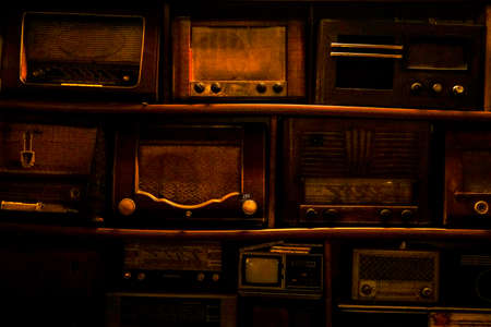 Stacked old radios backgroundの写真素材