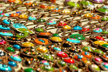 Vibrant colored ceramic necklaces texture backgroundの写真素材