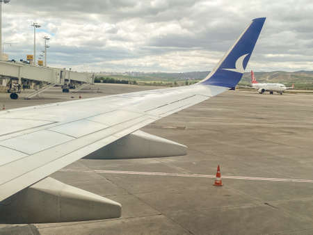 Airplane wings above cloudsのeditorial素材