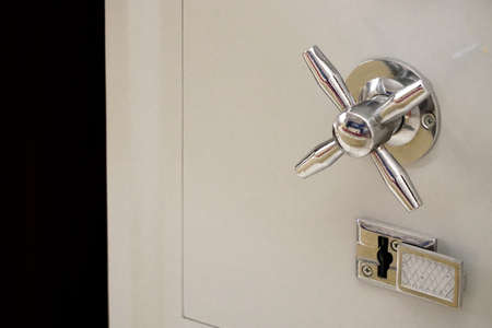 Grey colored steel safe close up viewの写真素材