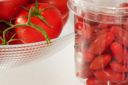 Fresh tomatoes in the fridge close up viewの写真素材