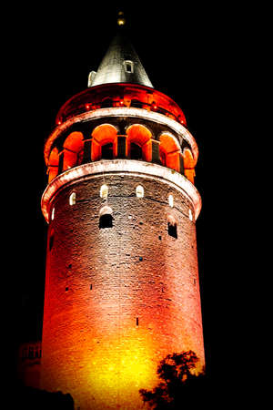 Galata tower in Istanbul Turkey at nightの写真素材