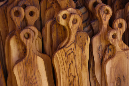 Chopping board made out of olive tree close up viewの写真素材