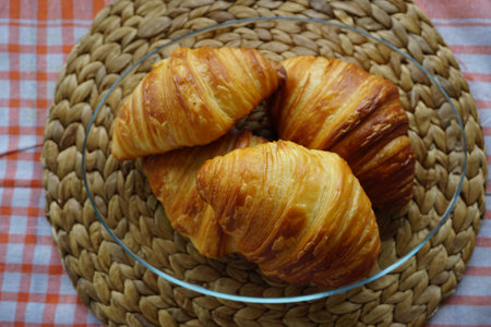 Croissant and coffee breakfast appetizers close up viewの写真素材