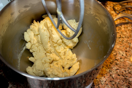 Sweet dough apple pie preparation in the kitchen close up viewの写真素材