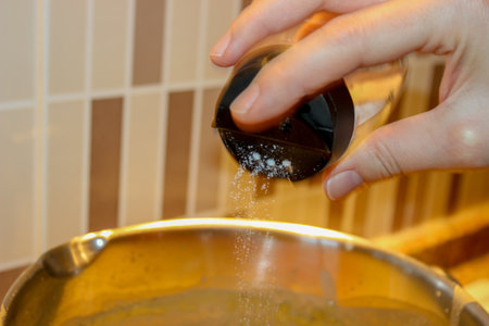 Lentil soup preparation in the kitchen close up viewの写真素材