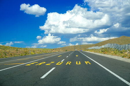 Erzurum road Sign on the road on a cloudy dayの写真素材