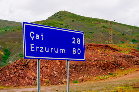 Erzurum road Sign on the road on a cloudy dayの写真素材