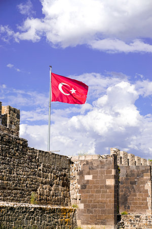 13 July 2025 Erzurum Turkey. Historical clock tower tepsi minaret from Saltuk era in city center with architectural details and war artifactsの写真素材