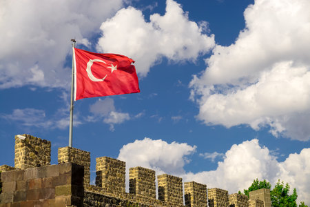13 July 2025 Erzurum Turkey. Historical clock tower tepsi minaret from Saltuk era in city center with architectural details and war artifactsの写真素材