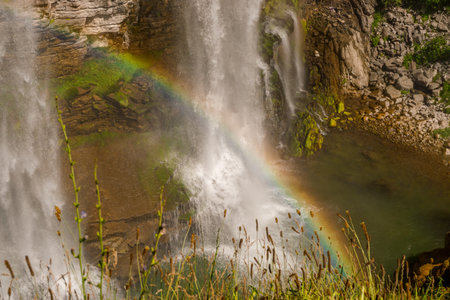14 July 2025 Tortum Erzurum. Tortum waterfall, tortum dam, lake and fish farms on the lake on a sunny day.の写真素材