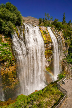 14 July 2025 Tortum Erzurum. Tortum waterfall, tortum dam, lake and fish farms on the lake on a sunny day.の写真素材