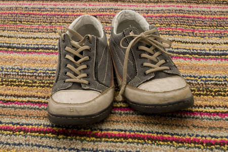 Sneakers Against Rugの写真素材