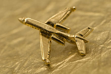 Plane Over Gold Foilの写真素材